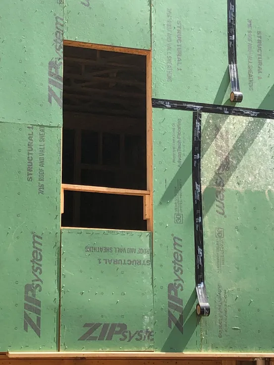 Siding nails driven through housewrap without sealing