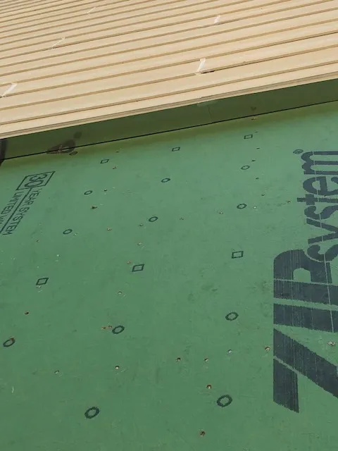 Multiple moisture barrier defects on the same wall — systemic failure